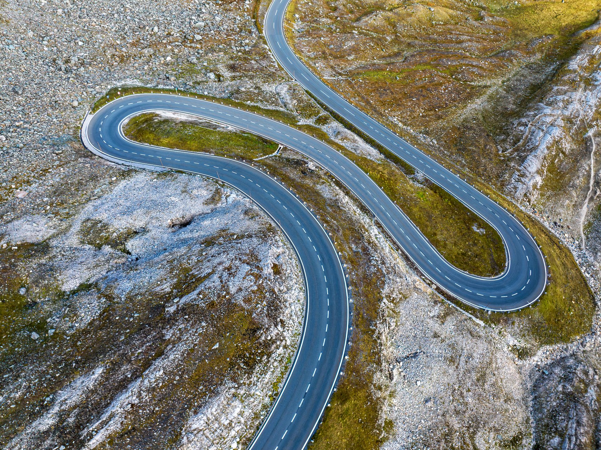 Mountain road hairpin turn from above